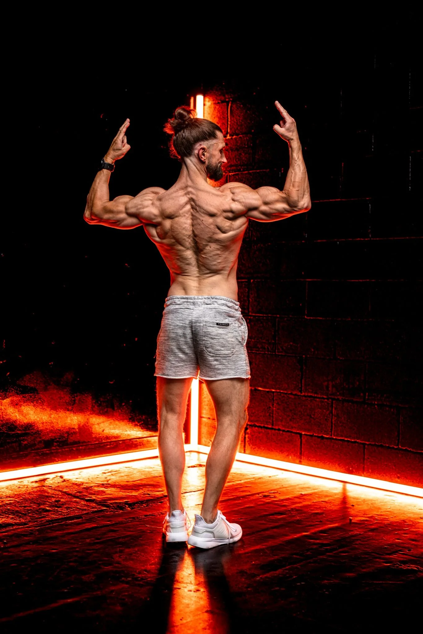 Nick performing a controlled strength exercise in the studio
